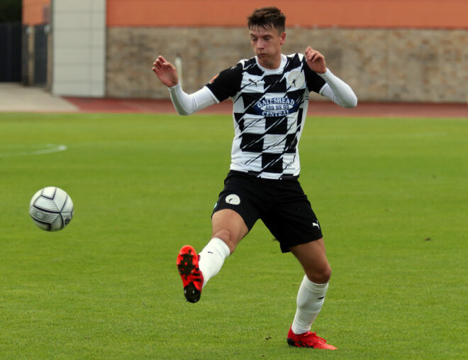 Wombwell hails atmosphere in home debut